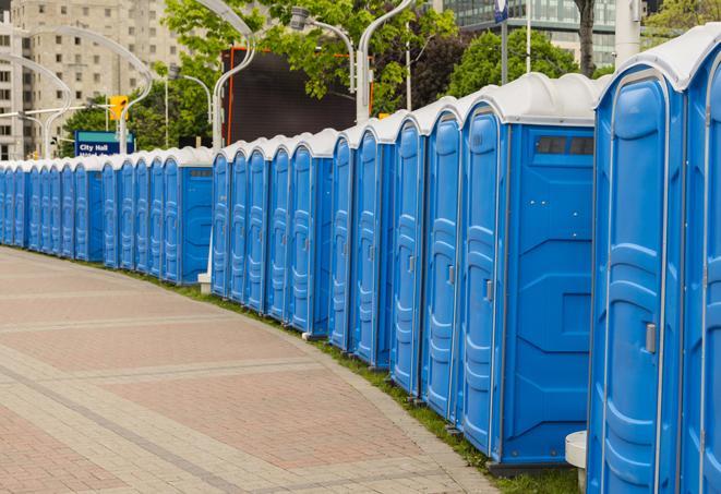 a line of portable restrooms at a sporting event, providing athletes and spectators with clean and accessible facilities in Bellbrook, OH